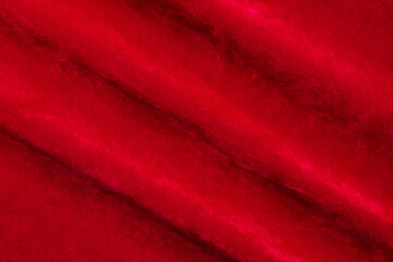 Red velvet fabric texture used as background. red fabric background of soft and smooth textile material. There is space for text..