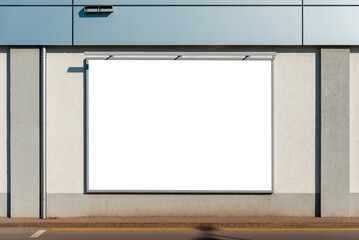Blank mockup white billboard of store street showcase in a city at evening.Clear shop...