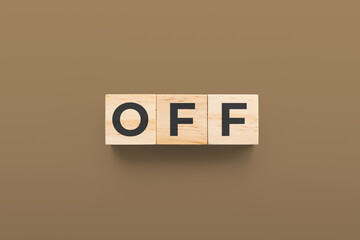 Off wooden cubes on brown background