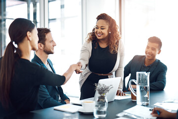 Obraz na płótnie Canvas Onboarding, welcome and business people with a handshake in a meeting for a partnership. Happy, thank you and women shaking hands in an interview for b2b, networking or agreement at a legal company