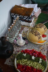 mitoni tradition culture in java indonesia for pregnant woman of 7 month by showering with holy water