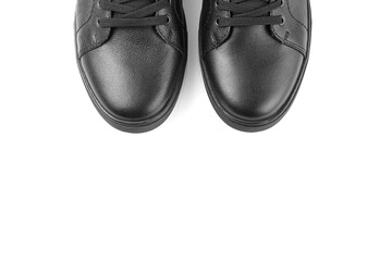 black leather sneakers on a white background