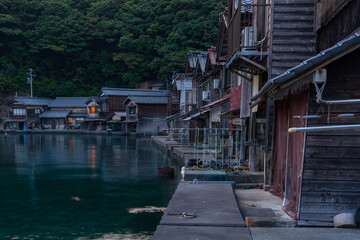 Night view of  traditional boathouses at Ine Town in Kyoto, Japan.