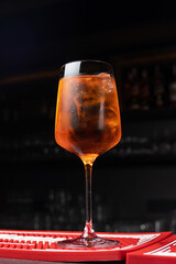 Delicious alcoholic cocktail on a dark background