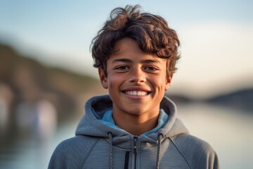 Close-up portrait photography of a happy kid male wearing soft sweatpants against a scenic lagoon background. With generative AI technology