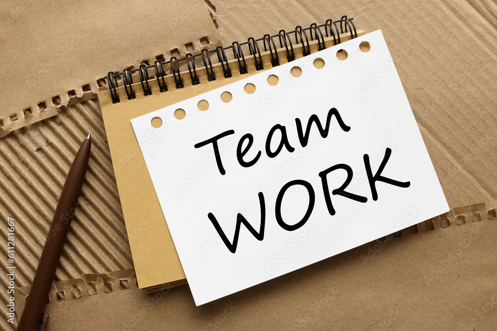 Poster two notepads on the background of craft paper with text. team work