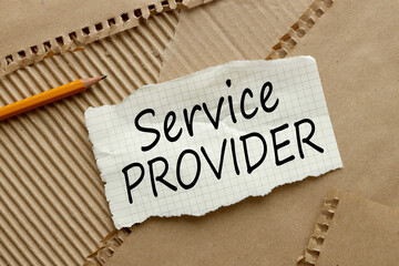 SERVICE PROVIDER text on torn paper on craft paper background. pencil points to text