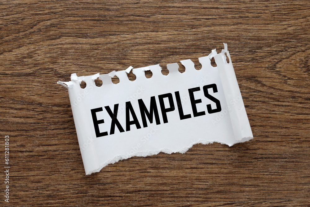 Poster torn paper from a notebook with the text example on the table