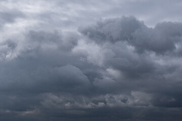 Naklejka na ściany i meble dramatic sky and gray clouds before the storm