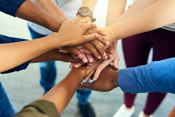 Team, hands together and trust of staff with collaboration, support and community. Diversity, worker friends and group with achievement, solidarity and agreement hand sign for teamwork success