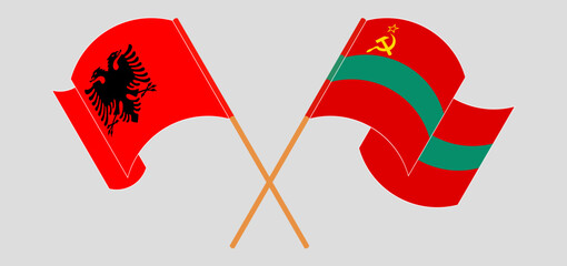 Crossed and waving flags of Albania and Transnistria