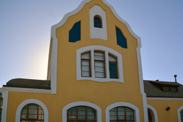 Exterior view of the old station building against a blue sky