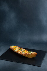 Polish fast food casserole on a dark background