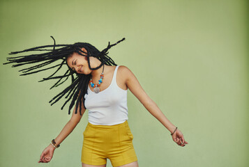 Happy, dance and freedom with black woman in studio for energy, natural and hip hop. Happiness,...