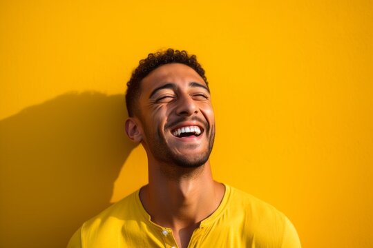 Headshot portrait photography of a satisfied boy in his 30s winking against a bright yellow background. With generative AI technology