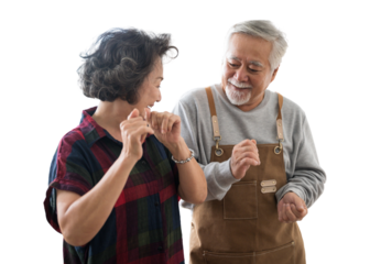 Asian mature senior couple is dancing and smiling in kitchen at home. isolated white background, remove background