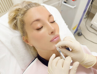 Hyaluronic acid injections for specific areas.Lip augmentation with hyaluronic acid fillers,using flexible hyaluronic acid fillers