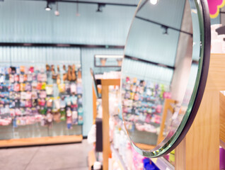 buying make up at cosmetics section in store. choosing cosmetics, perfumes, creams and shampoos, Using tester.