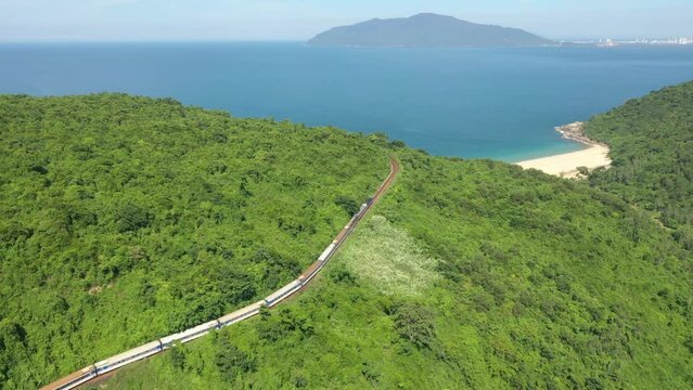  Trains movement aerial view. The movement of trains at Hai Van pass, Da Nang, Vietnam