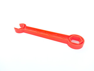 red wrench isolated on white