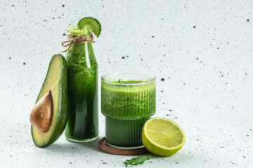 Fresh green detox smoothie on white background, diet and health concept. organic healthy products....