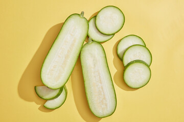 View from top of two halves of winter melon and several slices. Winter melon (Benincasa hispida) promote your health and help protect your body from disease