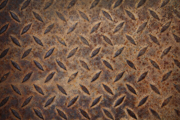 Rusty alternating pattern steel plate texture background