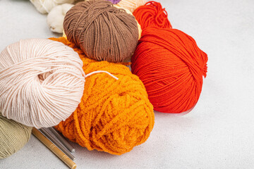 A set of colorful clew of thread for knitting and special craft tools. Handmade, hobby concept