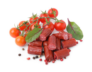 Delicious smoked sausages, tomatoes, pepper and spinach isolated on white