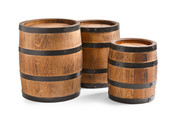 Fototapeta premium Three traditional wooden barrels on white background