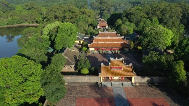 Minh Mang tomb near the Imperial City with the Purple Forbidden City within the Citadel in Hue, Vietnam. Imperial Royal Palace of Nguyen dynasty in Hue. Hue is a popular