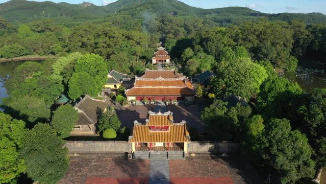 Minh Mang tomb near the Imperial City with the Purple Forbidden City within the Citadel in Hue, Vietnam. Imperial Royal Palace of Nguyen dynasty in Hue. Hue is a popular