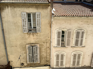 Arles, France - 26.04.2023. Street view of Arles, in the south of France. Facade of old residential...