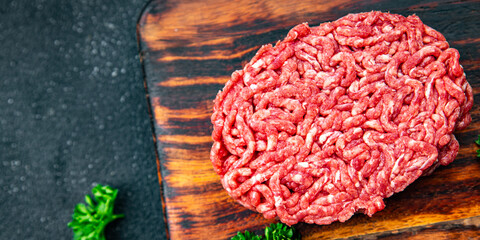 raw cutlet fresh meat ground beef, pork, chicken healthy meal food snack on the table copy space food background rustic top view