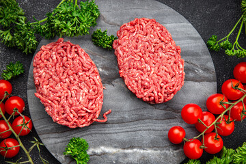 raw cutlet fresh meat ground beef, pork, chicken healthy meal food snack on the table copy space food background rustic top view