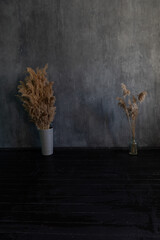 decorative flowers in a dark room on a gray background