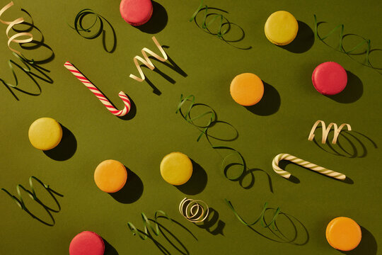 Candies on green background