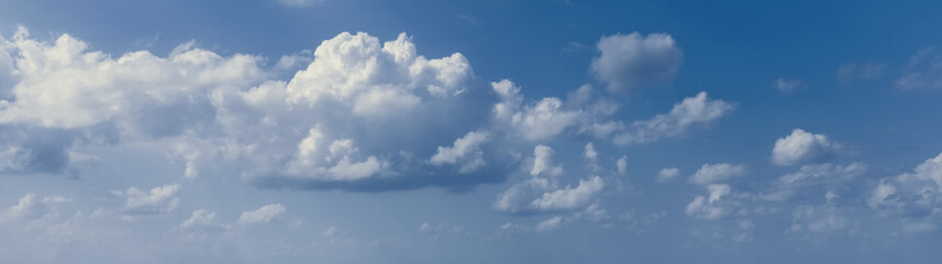 Obraz premium A lovely blue sky with white fluffy clouds