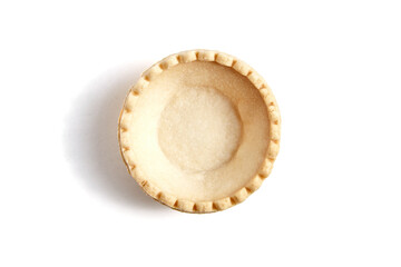 Tartlet shell isolated on white background, top view. Single empty mini tart shell for portable desserts