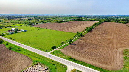 Aerial view of farmland in the Duffins Rouge Agricultural Preserve, Durham County, Ontario, Canada. Spring 2023
