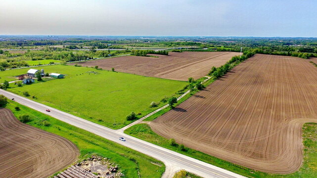 Aerial view of farmland in the Duffins Rouge Agricultural Preserve, Durham County, Ontario, Canada. Spring 2023