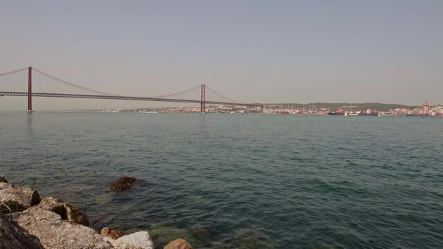 05-10-2022 - Lisbon, Portugal - Harbor with bridge