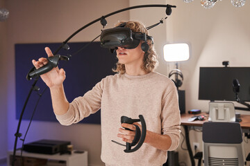 Young active guy in his room