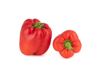 Two ripe sweet red peppers isolated on white background.