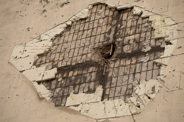 The Harrowing Reminder: Capturing the Mark Left by the Projectile on the House