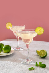 Margarita cocktail with lime and mint. Classic Margarita or Daiquiry Cocktail. Refreshing summer cocktail