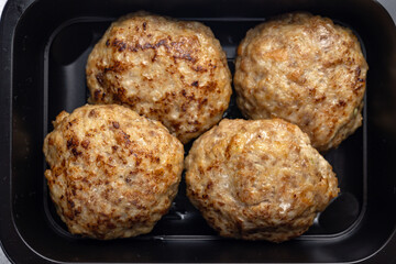 Delicious meat dishes in a black box. Delivery