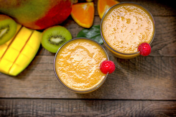 Mango juice, freshly squeezed mango smoothie, a delicious refreshing drink made with exotic fruits