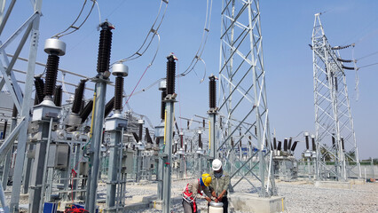 115kV Lightning Arrester testing at High voltage take-off tower by electrical engineer and commissioning team.