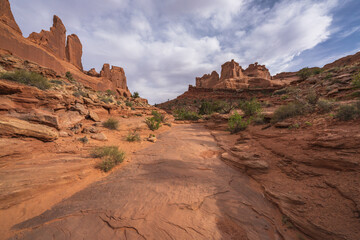 hiking the park avenue trail in arches national park, utah, usa